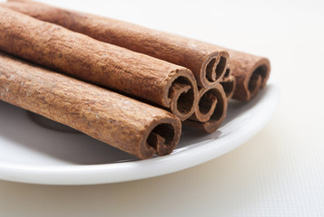 cinnamon on white background