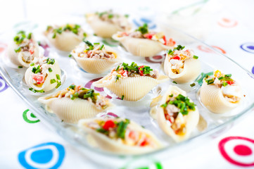 Delicious conchiglie pasta with tuna