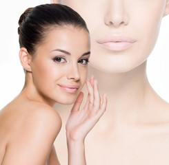 Beautiful woman cares for the face