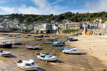 Fototapeta na wymiar Mousehole harbour Cornwall England UK Cornish fishing village