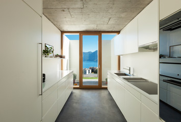 beautiful modern house in cement, interiors, white kitchen