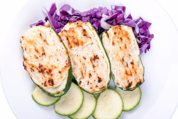 stuffed zucchini with tuna and cheese on white
