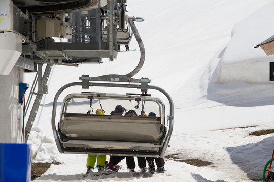 Skiers on a ski-lift