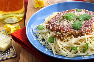 Spaghetti with cheese and mint leaf