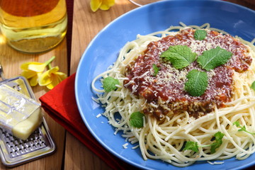 Spaghetti with cheese and mint leaf