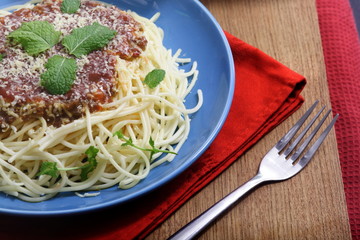 Spaghetti with cheese and mint leaf