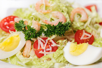 Beautiful and appetizing salad from vegetables closeup