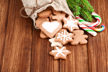 bag of cookies and candy over wooden board