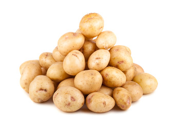 Big heap of uncooked ripe potato