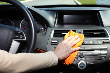 Hand cleaning car.