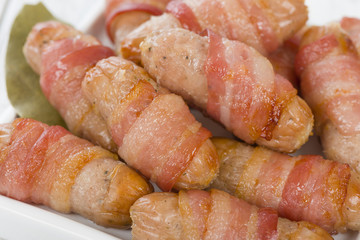 Pigs in Blankets - Sausages wrapped in bacon.
