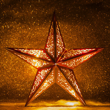 Weihnachtsstern mit glitzerndem Hintergrund