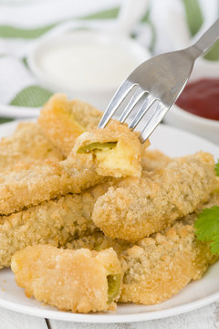 Stuffed Jalapenos - Chilies filled with cheese, breaded & fried