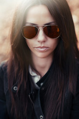 Beautiful girl face in sunglasses