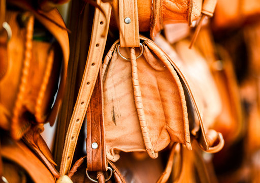 Leather bags on stall on the street market in Morocco