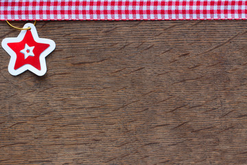 Obraz premium paper star on a wooden background