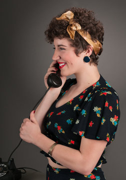 Pinup Girl in Flowered Outfit Profile on Phone