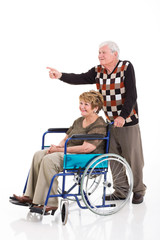 Fototapeta na wymiar senior man and handicapped wife