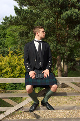 Scotsman in full dress kilt wear - 58227596