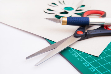 Cutting mat with paper and tools