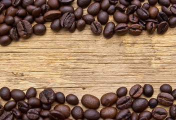 Fresh coffee beans on wood, ready to brew delicious coffee