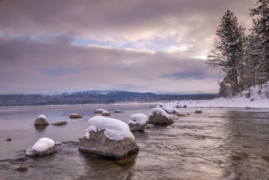 Idaho mountain lake in the winter with rocks and snow