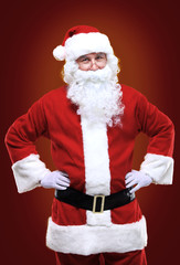 Photo of happy Santa Claus in eyeglasses looking at camera