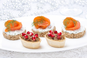 canape with salmon and tartlet with liver pate