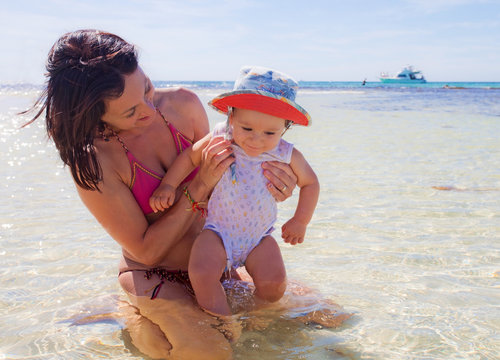 Mum And Baby On The Beach In Rottnest Island, Australia