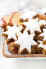 star cookies, nuts and spices for Christmas, selective focus