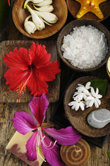 Fototapeta na wymiar beautiful set for tropical spa and aromatherapy