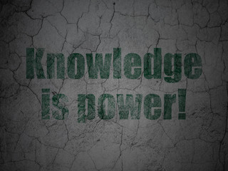 Education concept: Knowledge Is power! on grunge wall background