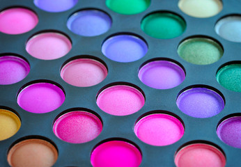 Professional eye shadows palette. Makeup background