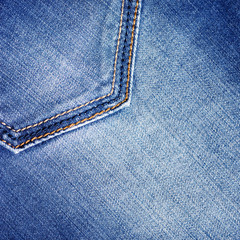 Texture of blue jeans. Close-up
