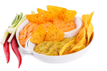 Nachos, guacamole and cheese sauce,  vegetables