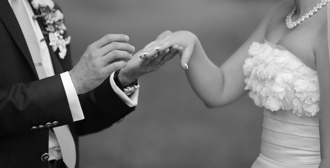 Hands of wedding couple.