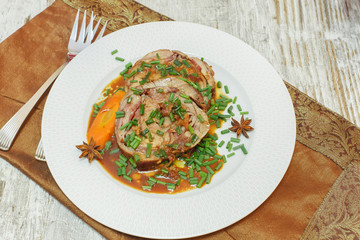 Veal Roulade. Meat roulade with vegetable and bacon stuffed