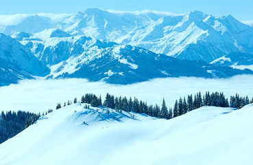 Cloudy sunny winter mountain landscape