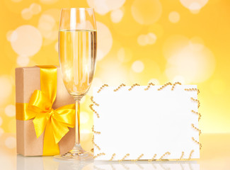 Champagne glass, gift and empty card