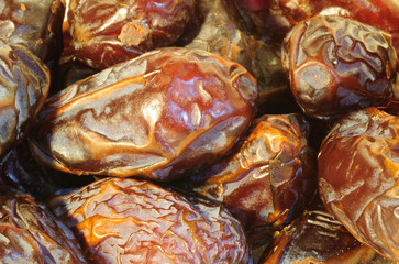 Close up view to Israeli dates of Medjool sort - most luscious and tasty dates.   