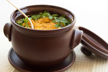 Roast with meat, potatoes in a clay pot