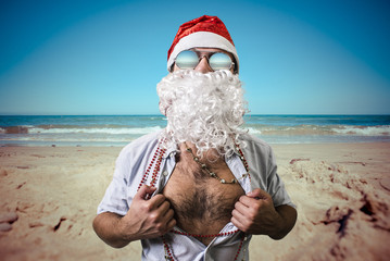 funny santa claus super hero beach summer christmas