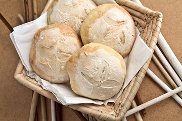 Crispy bread rolls in a basket