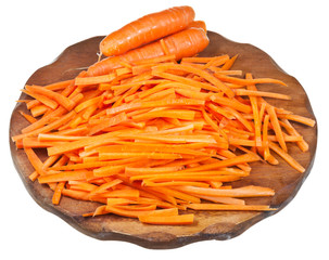 raw strips cut carrot on cutting board