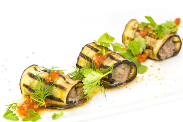 stuffed eggplant on a table in a restaurant