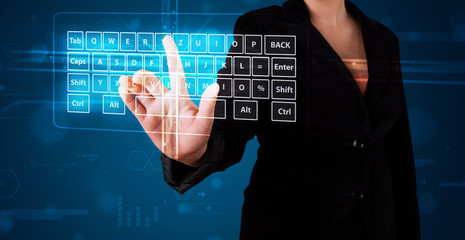 Girl pressing virtual type of keyboard