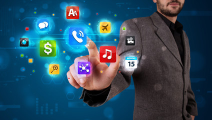 Businessman pressing various collection of buttons