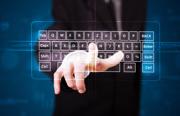 Businessman pressing virtual type of keyboard
