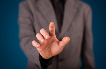 Businessman pressing imaginary button