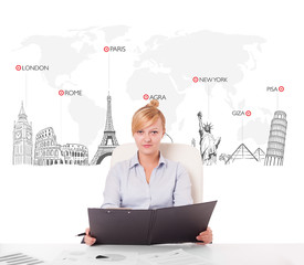 Beautiful businesswoman with world map and major landmarks of th